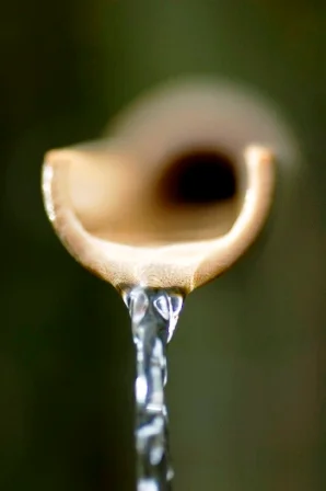 Water dripping from a pipe.